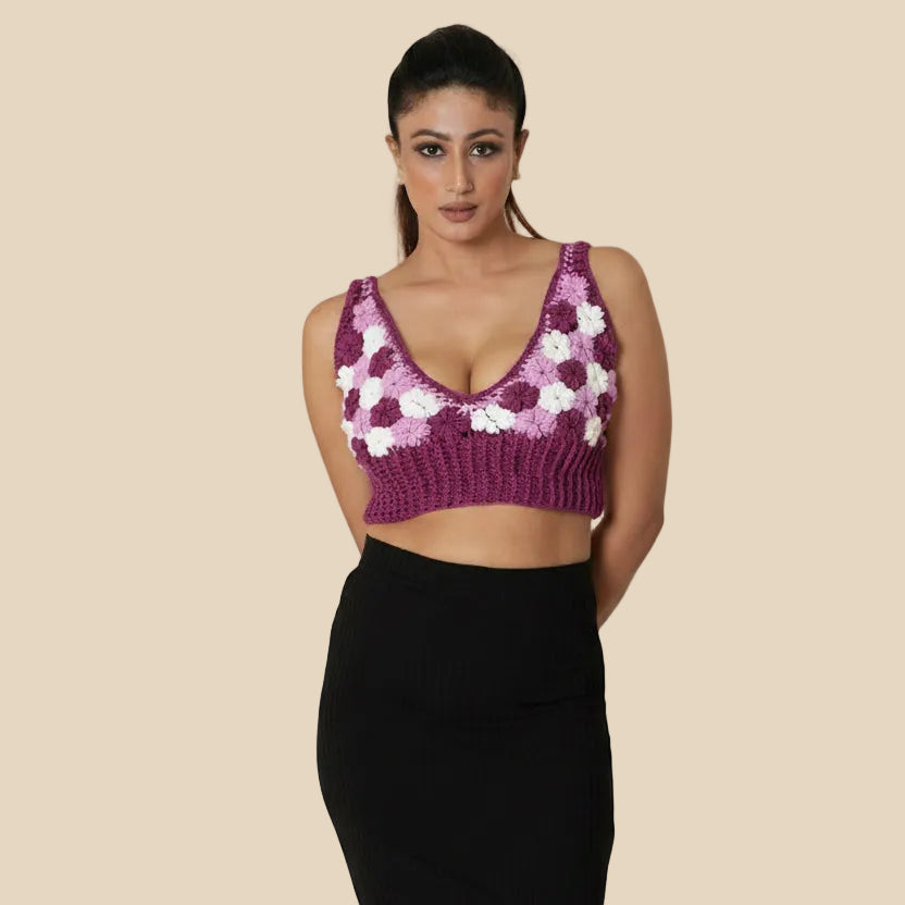 Women wearing a Purple and white floral cropped top 